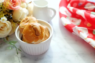 Close up of Singapore cookie on white plate.