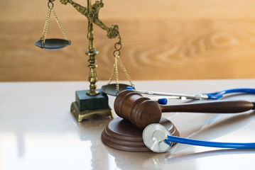 Law and Justice concept. Gavel and stethoscope