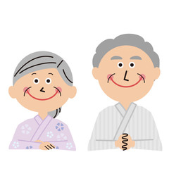 ポップな3世代家族　シニアの夫婦　浴衣で手をついて並ぶ