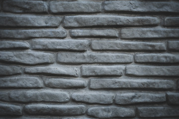 Pattern of gray stone background. Grey brick wall texture background. Vintage house facade. Gray stone wall grunge texture. Interior decoration. Concrete wall stone background material.