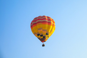 Naklejka premium Hot air balloons flying in blue sky