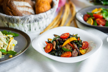 warm vegetable salad with meat. healthy food