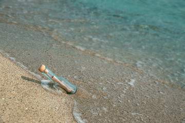 Message in a bottle on the beach seaside