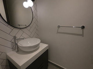 Guest toilet with wash basin. Toilet for guest interior in luxury house.