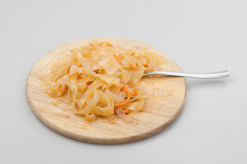 Funchoza salad with rice noodles on white. Copy space