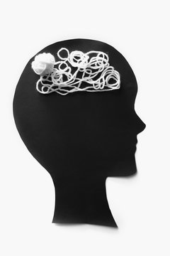 Human head with threads on white background. Concept of healthy brain