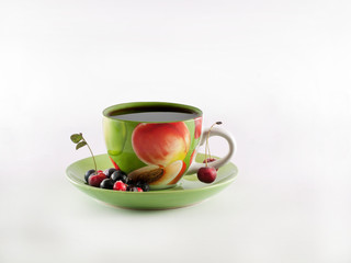 ?up of compote, frozen berries, cherries, black currants on a saucer. On a white background. Copy space