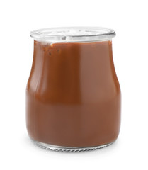 Jar of tasty salted caramel on white background