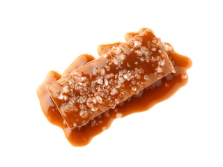 Tasty salty caramel candy on white background