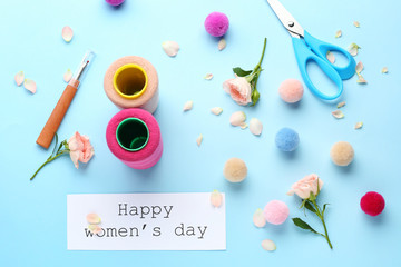 Greeting card for International Women's Day on color background