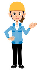 案内する建築現場作業員の女性　青い作業着