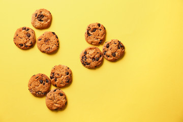 Tasty cookies on color background