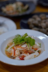 Spicy vermicelli salad in thailand restaurant Spicy seafood salad