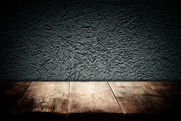wood boards and dark wall background. For product presentation