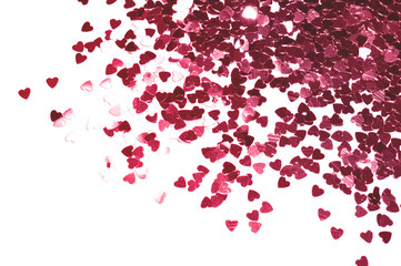 Glittering pink hearts on white background