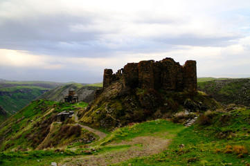 Fototapeta na wymiar Sunset view to Vahramashen Church and Amberd fortress in Armenia
