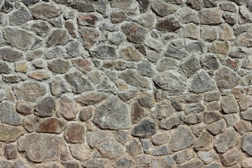 Background of natural cobbled gray stone