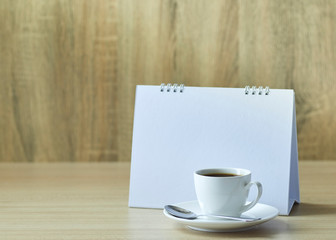 Holiday concept coffee and empty calendar