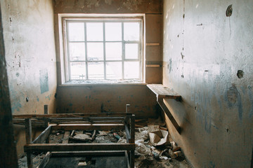 Abandoned houses and debris of devastation. Destroyed buildings from explosions during the war.