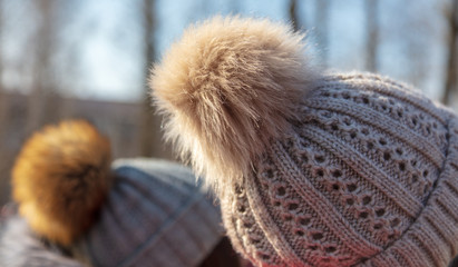 Fluffy fur on the girl’s hat