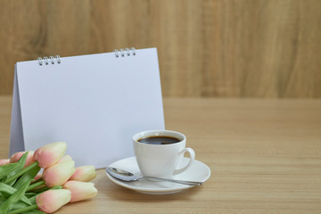 Holiday concept coffee and empty calendar