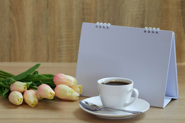 Holiday concept coffee and empty calendar