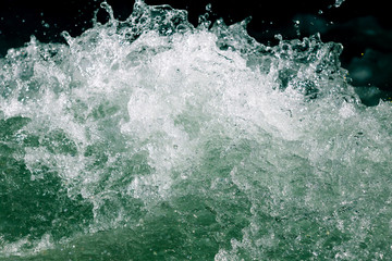 Splashes of water from the waves in the sea