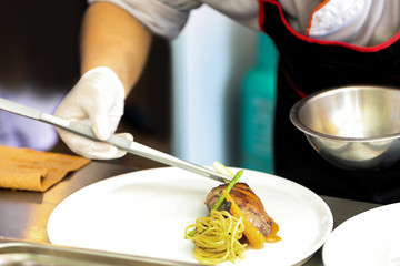 Chef preparing food, meal, in the kitchen, chef cooking, Chef decorating dish