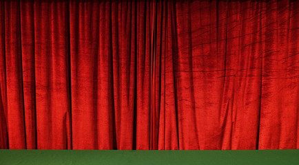 Stage red curtains in theater cinema