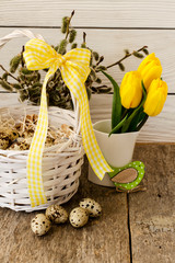 Easter composition on a wooden background. - Image