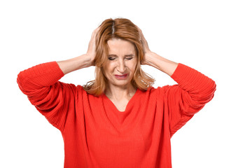 Stressed mature woman on white background