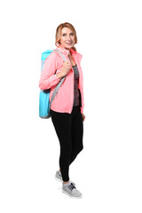 Sporty mature woman with mat on white background