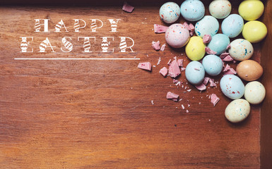 Easter eggs on wooden background. Easter card.
