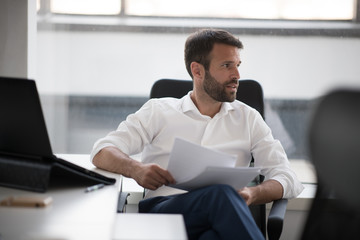 Fototapeta premium Manager in a meeting. Businessman at the office, working. 