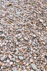 Beach pebbles toned texture background