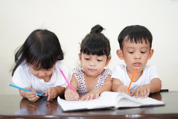student doing homework .Kid enjoy learning with happiness at home. Education concept             