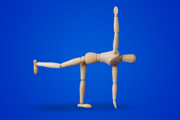 Sports wooden toy figure on blue