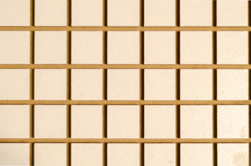The wooden checkered  background.