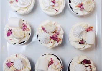 Delicious decorative sweet wedding cakes ona  bright, clean, white background