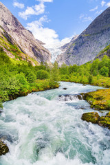 Fototapeta na wymiar Landscape with river near Briksdalsbreen glacier