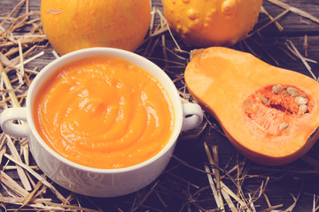 pumpkin soup on a wooden background