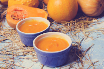 pumpkin soup on a wooden background