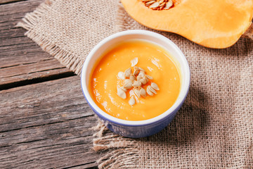 pumpkin soup on a wooden background