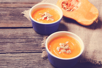 pumpkin soup on a wooden background