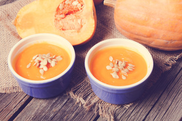 pumpkin soup on a wooden background