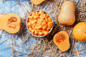 ingredients for pumpkin soup on a wooden background
