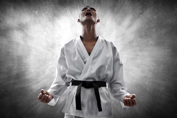 Zelfklevend Fotobehang Martial arts fighter © fotokitas