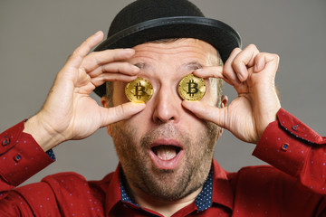 Man having bitcoin in eye