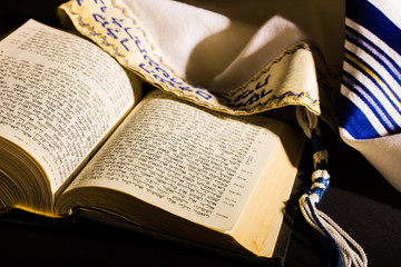 Hebrew Bible and a tallit, a jewish prayer shawl