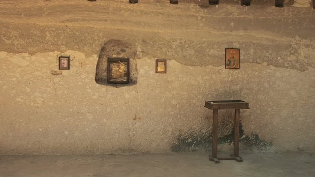 Panning of the prayer room in which the monks prayed in the ancient Vardzia cave monastery in Georgia